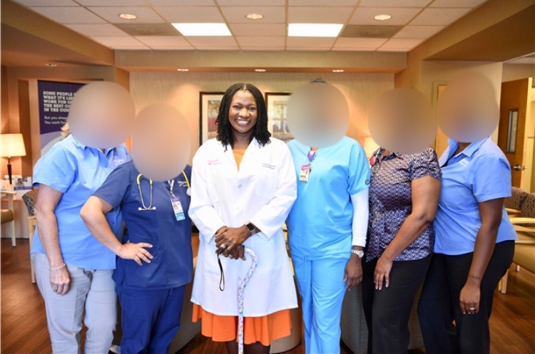 Dr. Folake and her old office staff